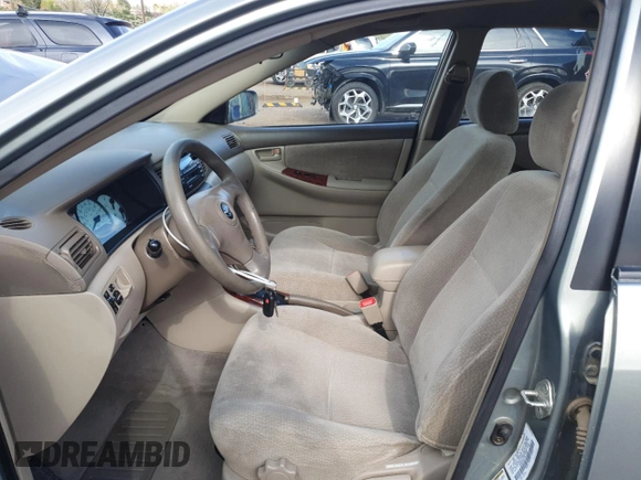 2004 Toyota Corolla CE with VIN 1NXBR38E44Z310906, listed as a Copart auction lot 55361565 with 186,022 mi miles and Salvage Title. Bid and sale history available at DreamBid. Image 7.