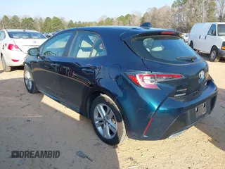 2021 Toyota Corolla Hatchback SE with VIN JTND4MBE9M3114388, listed as a IAAI auction lot 41796303 with 58,656 mi miles. Bid and sale history available at carsss.com. Image 3.