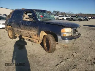 2002 GMC Yukon SLT with VIN 1GKEK13Z62J148557, listed as a Copart auction lot 43246075 with 242,968 mi miles and Salvage Title. Bid and sale history available at carsss.com. Image 12.