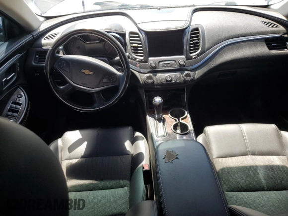2014 Chevrolet Impala LT with VIN 2G1115SL2E9244163, listed as a Copart auction lot 57328675 with 136,548 mi miles and Salvage title. Bid and sale history available at DreamBid. Image 8.