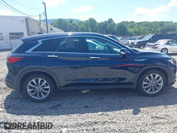 2022 Infiniti QX50 Luxe z VIN 3PCAJ5BA9NF108288, wystawiony jako IAAI lot #42646497 z przebiegiem 65 145 mil mil oraz . Historia ofert i sprzedaży dostępna na DreamBid. Obrazek 13.