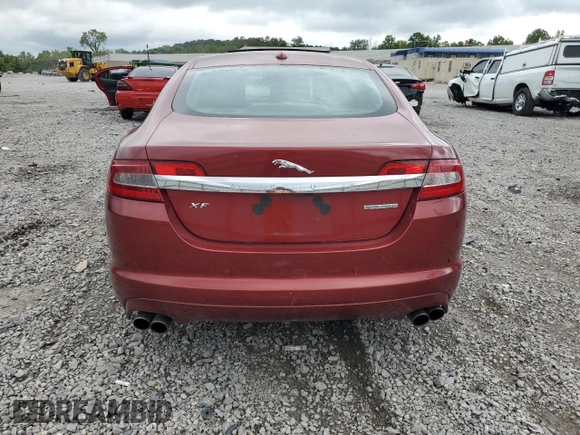 2010 Jaguar XF Supercharged with VIN SAJWA0HE1AMR74203, listed as a Copart auction lot 64029824 with 128,676 mi miles and Salvage Title. Bid and sale history available at carsss.com. Image 6.