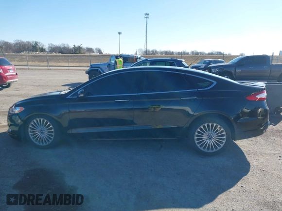 2016 Ford Fusion Titanium with VIN 3FA6P0K95GR135766, listed as a IAAI auction lot 41735040 with 99,256 mi miles. Bid and sale history available at carsss.com. Image 14.
