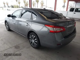 2015 Nissan Sentra S with VIN 3N1AB7AP9FY256920, listed as a IAAI auction lot 41491292 with 163,404 mi miles and . Bid and sale history available at DreamBid. Image 3.
