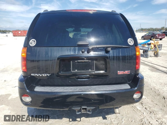 2007 GMC Envoy SLE with VIN 1GKDS13S472107120, listed as a Copart auction lot 42393475 with 106,499 mi miles and Salvage Title. Bid and sale history available at carsss.com. Image 6.