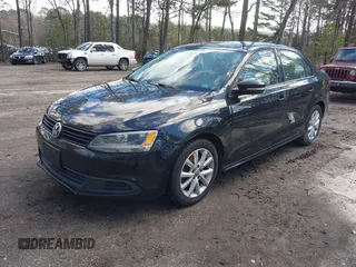 2012 Volkswagen Jetta SE with VIN 3VWDX7AJ5CM351398, listed as a IAAI auction lot 41734647 with 229,671 mi miles and . Bid and sale history available at DreamBid. Image 2.