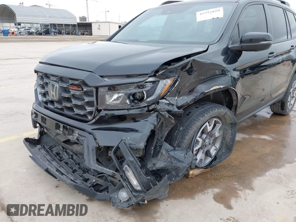 2023 Honda Passport TrailSport with VIN 5FNYF8H67PB006933, listed as a IAAI auction lot 41597859 with 34,145 mi miles and . Bid and sale history available at carsss.com. Image 6.