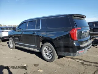 2021 GMC Yukon XL SLT with VIN 1GKS1GKD2MR243619, listed as a Copart auction lot 84262484 with 125,419 mi miles and Salvage Title. Bid and sale history available at carsss.com. Image 2.