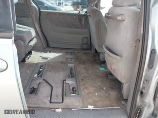 2003 Mazda MPV LX with VIN JM3LW28A830351254, listed as a IAAI auction lot 41703167 with 232,786 mi miles. Bid and sale history available at carsss.com. Image 8.