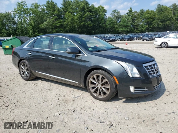 2013 Cadillac XTS Luxury with VIN 2G61P5S34D9212029, listed as a Copart auction lot 61874985 with 145,762 mi miles and Clean title. Bid and sale history available at DreamBid. Image 4.