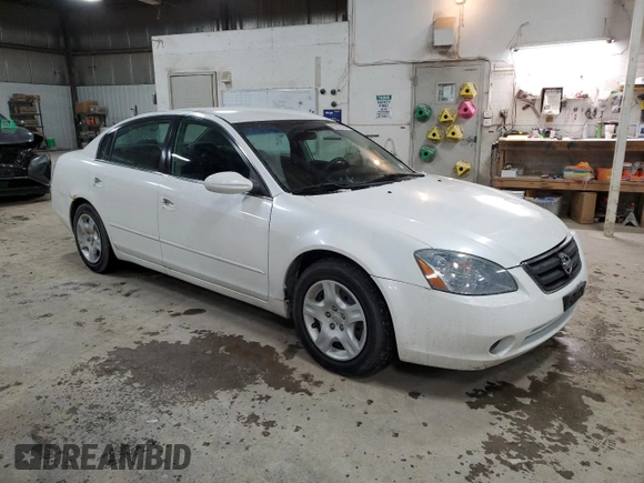 2002 Nissan Altima SL with VIN 1N4AL11D92C285520, listed as a Copart auction lot 85978794 with 128,788 mi miles and Salvage Title. Bid and sale history available at carsss.com. Image 4.