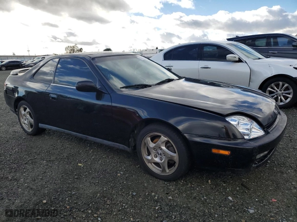 2000 Honda Prelude with VIN JHMBB6144YC007274, listed as a Copart auction lot 85072464 with 176860 miles and Salvage Title. Bid and sale history available at carsss.com. Image 4.