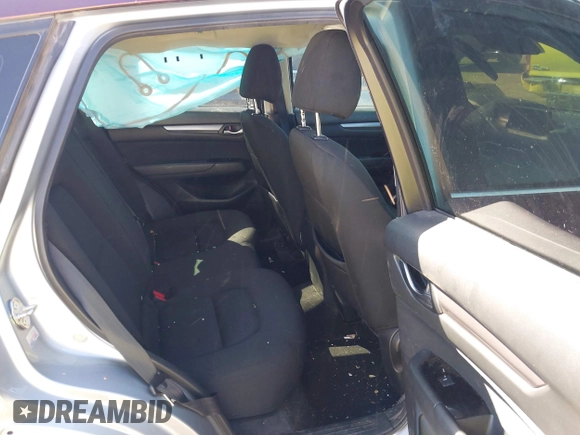 2019 Mazda CX-5 Sport with VIN JM3KFABM2K0686372, listed as a IAAI auction lot 41770183 with 57,202 mi miles and . Bid and sale history available at DreamBid. Image 8.