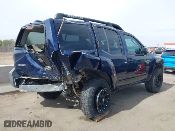 2007 Nissan Xterra SE with VIN 5N1AN08UX7C516092, listed as a IAAI auction lot 41562759 with 210,857 mi miles and . Bid and sale history available at DreamBid. Image 4.