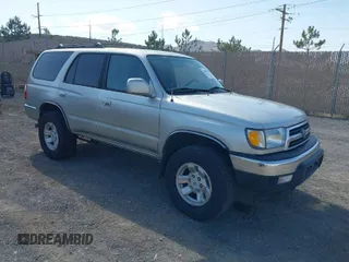 2000 Toyota 4Runner SR5 z VIN JT3HN86R5Y0287277, wystawiony jako IAAI lot #41985408 z przebiegiem 275 462 mil mil oraz . Historia ofert i sprzedaży dostępna na DreamBid. Obrazek 1.