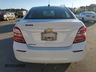 2018 Chevrolet Sonic LS with VIN 1G1JB5SH8J4121988, listed as a Copart auction lot 88000095 with 64,875 mi miles and Salvage title. Bid and sale history available at DreamBid. Image 6.
