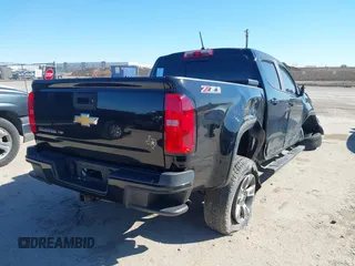 2018 Chevrolet Colorado 2WD Z71 with VIN 1GCGSDEN7J1117011, listed as a IAAI auction lot 41728108 with 51,618 mi miles and . Bid and sale history available at DreamBid. Image 4.