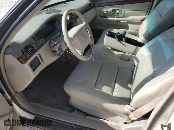 1999 Cadillac DeVille z VIN 1G6KD54YXXU794473, wystawiony jako Copart lot #79774804 z przebiegiem 44 601 mil mil oraz Czysty tytuł • Clean title. Historia ofert i sprzedaży dostępna na DreamBid. Obrazek 7.