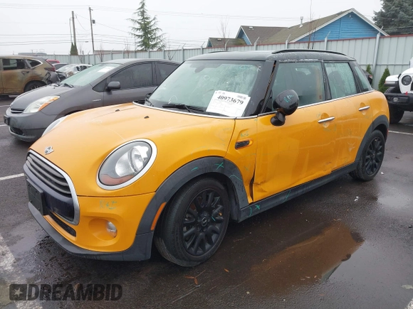 2018 MINI Hardtop 4 Door Cooper with VIN WMWXU1C59J2F79169, listed as a IAAI auction lot 40973679 with 97,507 mi miles and . Bid and sale history available at DreamBid. Image 18.
