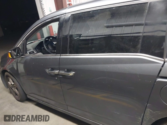2012 Honda Odyssey Touring с VIN 5FNRL5H99CB047340, выставлен на аукционе IAAI как лот 41965189 с пробегом Не указан миль и . История ставок и продаж доступна на DreamBid. Изображение 14.