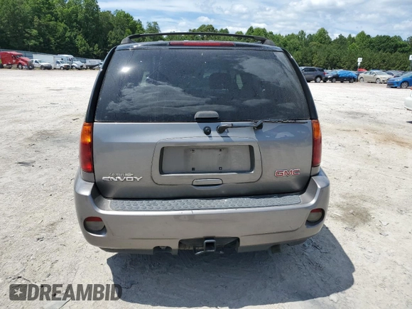 2006 GMC Envoy Denali with VIN 1GKET63M662285870, listed as a Copart auction lot 59828134 with 262,804 mi miles and Salvage Title. Bid and sale history available at DreamBid. Image 6.