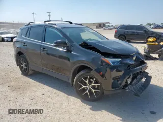 2018 Toyota RAV4 SE with VIN 2T3NFREV6JW436488, listed as a Copart auction lot 60297905 with 74,034 mi miles and Salvage title. Bid and sale history available at DreamBid. Image 4.