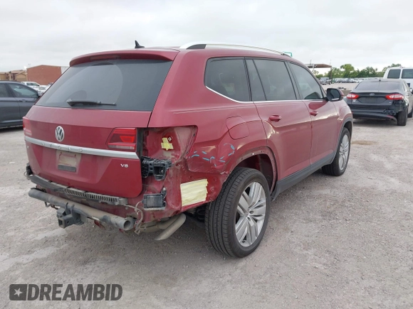 2019 Volkswagen Atlas SE with VIN 1V2WR2CA4KC606661, listed as a IAAI auction lot 42581054 with 89,079 mi miles and . Bid and sale history available at DreamBid. Image 4.