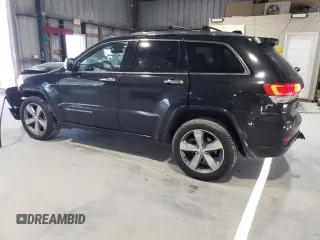 2015 Jeep Grand Cherokee Overland with VIN 1C4RJFCG0FC783375, listed as a Copart auction lot 61966725 with 191,478 mi miles and Salvage title. Bid and sale history available at DreamBid. Image 2.