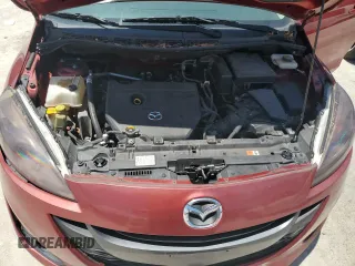 2013 Mazda 5 Touring z VIN JM1CW2CL2D0159718, wystawiony jako Copart lot #61245655 z przebiegiem 143 012 mil mil oraz Czysty tytuł • Clean title. Historia ofert i sprzedaży dostępna na DreamBid. Obrazek 12.