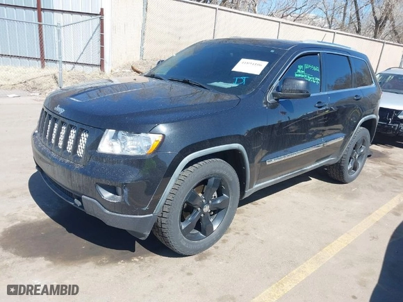 2011 Jeep Grand Cherokee Laredo with VIN 1J4RR4GG0BC656301, listed as a IAAI auction lot 41894106 with 95,293 mi miles. Bid and sale history available at carsss.com. Image 2.