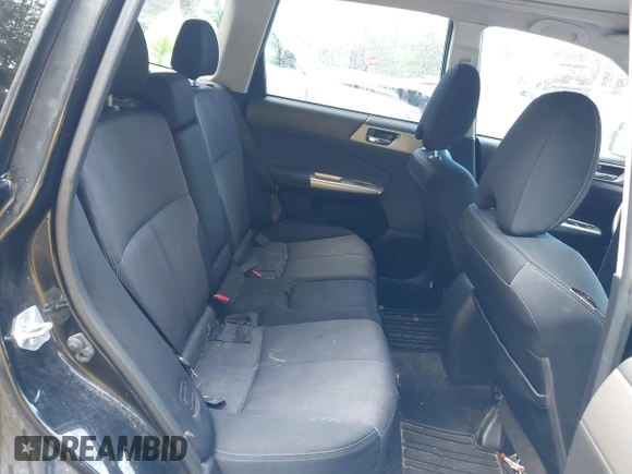 2009 Subaru Forester X with VIN JF2SH63619H738409, listed as a IAAI auction lot 42428672 with 190,636 mi miles and . Bid and sale history available at DreamBid. Image 8.