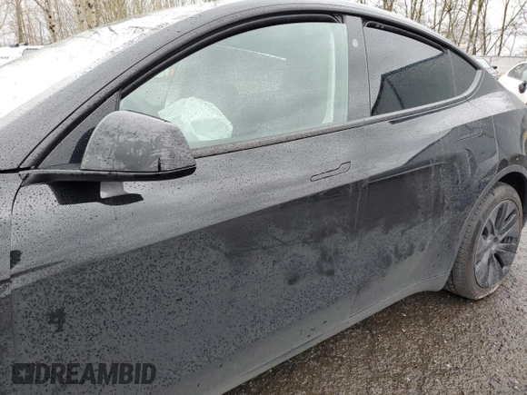 2024 Tesla Model Y Long Range with VIN 7SAYGDEE2RF131085, listed as a Copart auction lot 50171055 with Not Provided miles and Salvage Title. Bid and sale history available at DreamBid. Image 7.