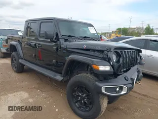 2021 Jeep Gladiator Freedom с VIN 1C6HJTAG4ML586999, выставлен на аукционе IAAI как лот 41911751 с пробегом 81 030 миль миль и . История ставок и продаж доступна на DreamBid. Изображение 1.