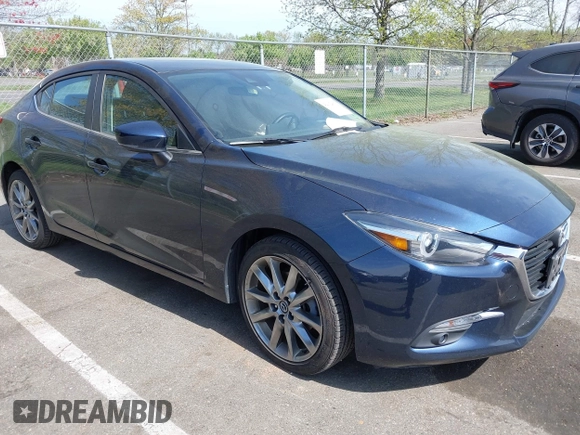 2018 Mazda 3 Grand Touring with VIN 3MZBN1W36JM213063, listed as a IAAI auction lot 42102460 with 49,180 mi miles and . Bid and sale history available at DreamBid. Image 1.