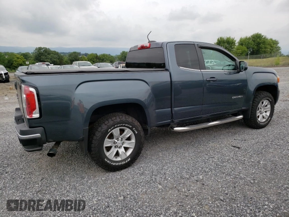 2015 GMC Canyon 2WD SLE with VIN 1GTH5BEA7F1158758, listed as a Copart auction lot 63617524 with 102,744 mi miles and Salvage Title. Bid and sale history available at carsss.com. Image 3.