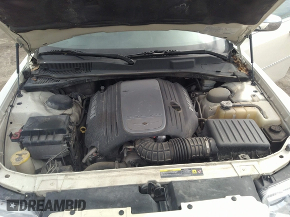 2005 Chrysler 300 with VIN 2C3JA63H65H144648, listed as a IAAI auction lot 41762730 with 125,757 mi miles. Bid and sale history available at carsss.com. Image 10.