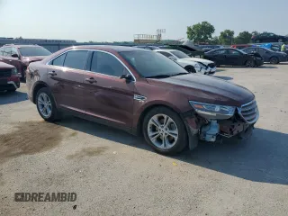 2015 Ford Taurus SEL with VIN 1FAHP2E96FG161735, listed as a Copart auction lot 61865294 with 148,070 mi miles and Salvage Title. Bid and sale history available at DreamBid. Image 4.