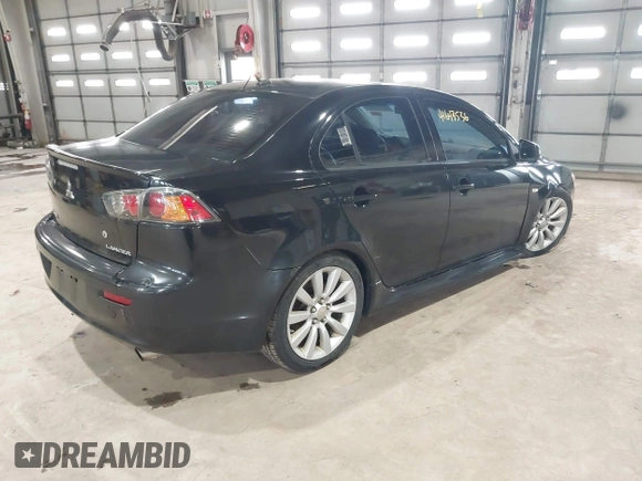 2011 Mitsubishi Lancer GTS with VIN JA32U8FW7BU034390, listed as a IAAI auction lot 41643536 with 130,319 mi miles and . Bid and sale history available at carsss.com. Image 4.