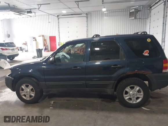 2003 Ford Escape XLT Popular with VIN 1FMYU03103KA06087, listed as a IAAI auction lot 42596326 with 210,441 mi miles and . Bid and sale history available at DreamBid. Image 14.