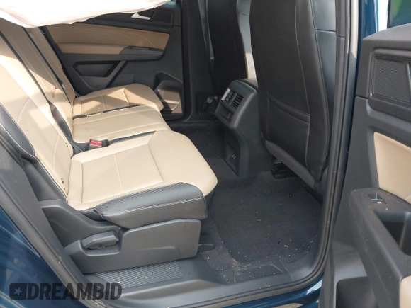 2022 Volkswagen Atlas SE z VIN 1V2KC2CA9NC216742, wystawiony jako IAAI lot #42406428 z przebiegiem 34 598 mil mil oraz . Historia ofert i sprzedaży dostępna na DreamBid. Obrazek 8.
