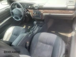 2004 Chrysler Sebring LXi z VIN 1C3EL55R24N188597, wystawiony jako Copart lot #58749505 z przebiegiem 70 249 mil mil oraz Tytuł czysty. Historia ofert i sprzedaży dostępna na DreamBid. Obrazek 8.