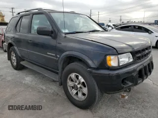 2001 Isuzu Rodeo S with VIN 4S2CK58W814333364, listed as a Copart auction lot 84656114 with 140,489 mi miles and Salvage title. Bid and sale history available at DreamBid. Image 4.