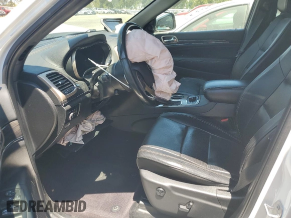 2017 Jeep Grand Cherokee Overland with VIN 1C4RJFCT5HC777748, listed as a Copart auction lot 63121635 with 106,991 mi miles and Salvage title. Bid and sale history available at DreamBid. Image 7.