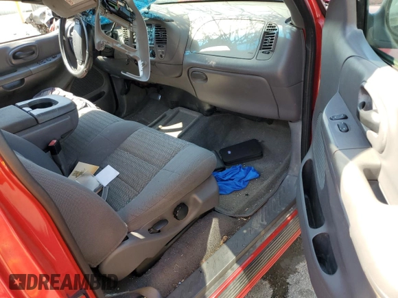 2001 Ford F-150 XL z VIN 2FTRF18W21CA50638, wystawiony jako Copart lot #53474355 z przebiegiem Nie podano mil oraz Nie do naprawy • Non repairable. Historia ofert i sprzedaży dostępna na DreamBid. Obrazek 8.