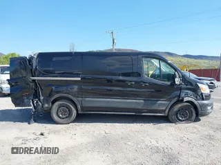 2021 Ford Transit Cargo with VIN 1FTYE1Y85MKA34465, listed as a IAAI auction lot 41736879 with 77,215 mi miles. Bid and sale history available at carsss.com. Image 13.