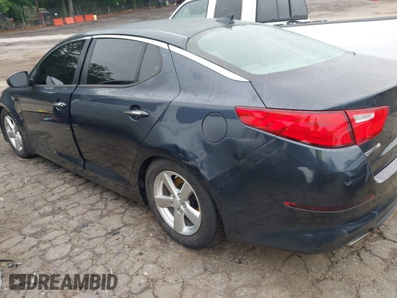2015 Kia Optima LX with VIN 5XXGM4A70FG486256, listed as a IAAI auction lot 42211318 with 141,515 mi miles and . Bid and sale history available at DreamBid. Image 6.