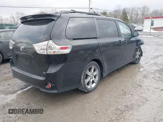 2012 Toyota Sienna SE with VIN 5TDXK3DC4CS187677, listed as a IAAI auction lot 41553292 with 145,282 mi miles. Bid and sale history available at carsss.com. Image 4.