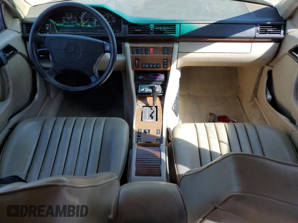 1994 Mercedes-Benz E with VIN WDBEA92E2RF283381, listed as a Copart auction lot 50025645 with 131,140 mi miles and Salvage Title. Bid and sale history available at DreamBid. Image 8.