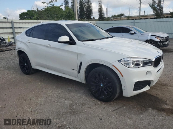 2019 BMW X6 xDrive35i with VIN 5UXKU2C5XK0Z64512, listed as a Copart auction lot 52157073 with 59,988 mi miles. Bid and sale history available at carsss.com. Image 4.
