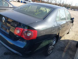 2006 Volkswagen Jetta Sedan Value Edition with VIN 3VWPF71KX6M792523, listed as a IAAI auction lot 41766781 with 999,999 mi miles. Bid and sale history available at carsss.com. Image 4.